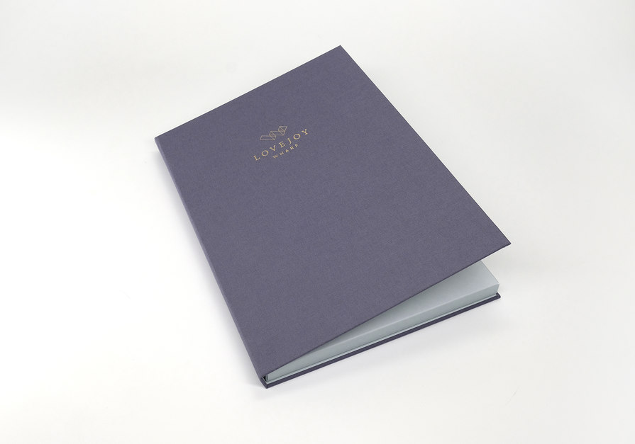 purple brochure cover with gold foil – Lovejoy Wharf – point one percent