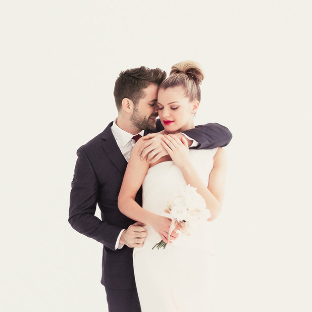 groom hugging bride from behind – Everband – Point one percent